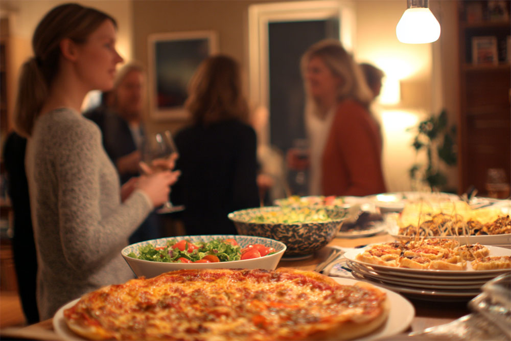 Family style servering pizza